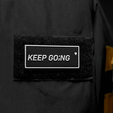 Keep Going velcro patch on ghostn compliance jacket